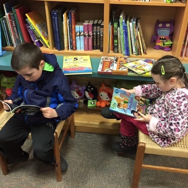 Preschoolers actively learning and growing in a nurturing classroom